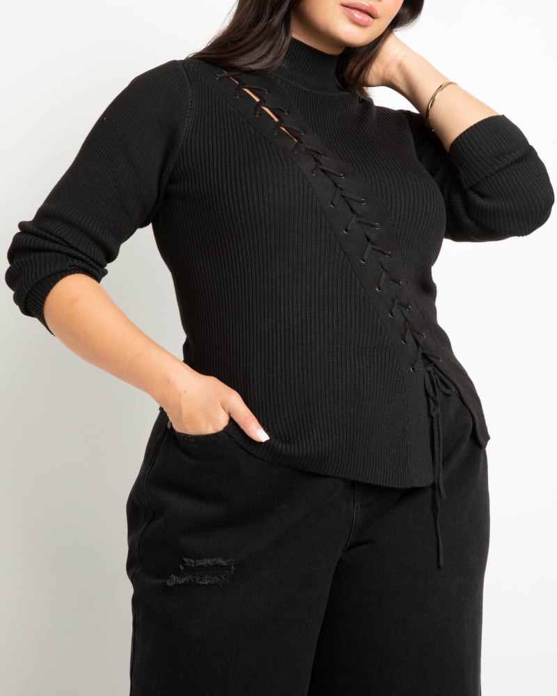 Front of a model wearing a size 14/16 Sadie Lacing Detail Sweater in Totally Black by ELOQUII. | dia_product_style_image_id:236350